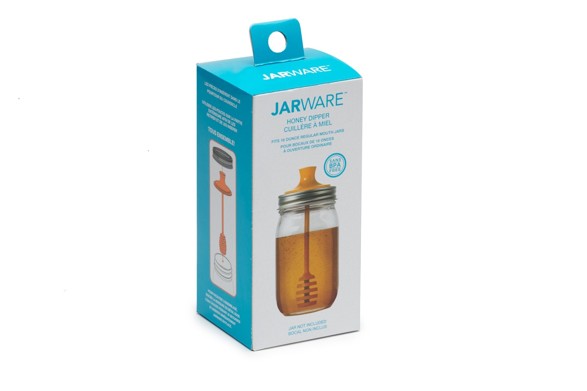 Jarware in a kitchen ready to drizzle honey
