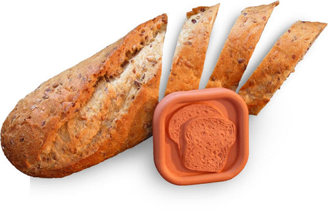 JBK Pottery bread saver disc on counter keeps loaves fresh longer.