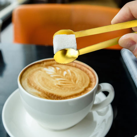 JCREN tongs at a tea party setup for precise, effortless serving.