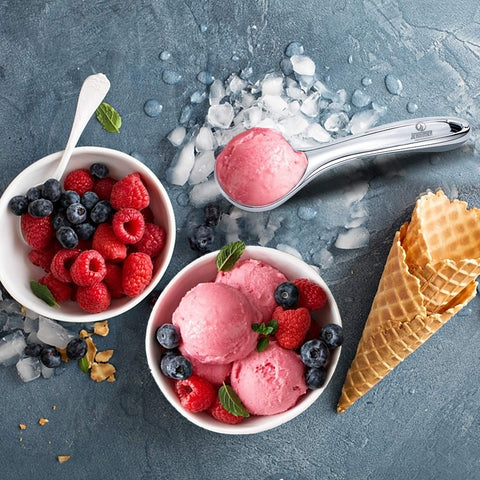 JENNIMER scoop with textured rubber handle offering secure grip for tough ice cream.