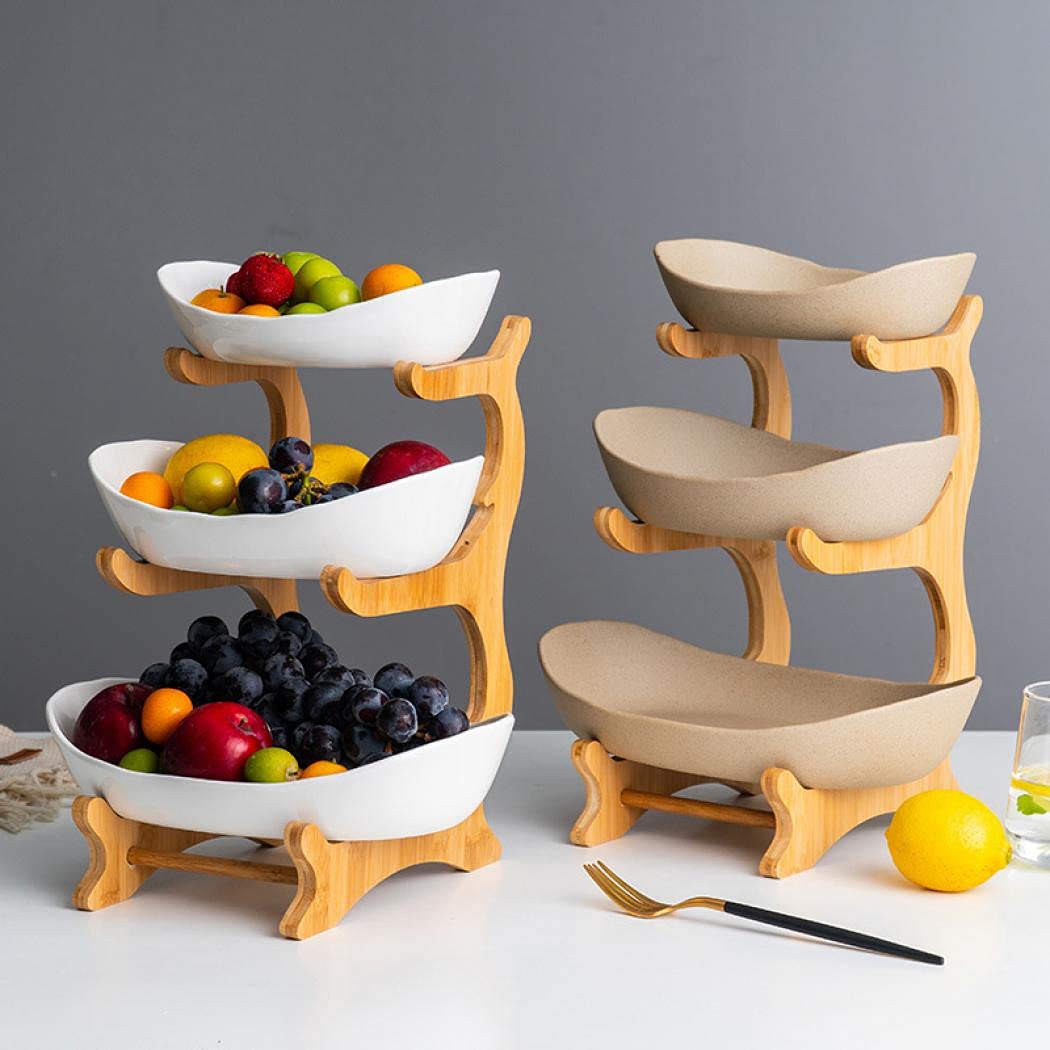 Jessie top-tier porcelain bowl displaying fresh fruit on a counter.