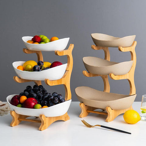Jessie top-tier porcelain bowl displaying fresh fruit on a counter.