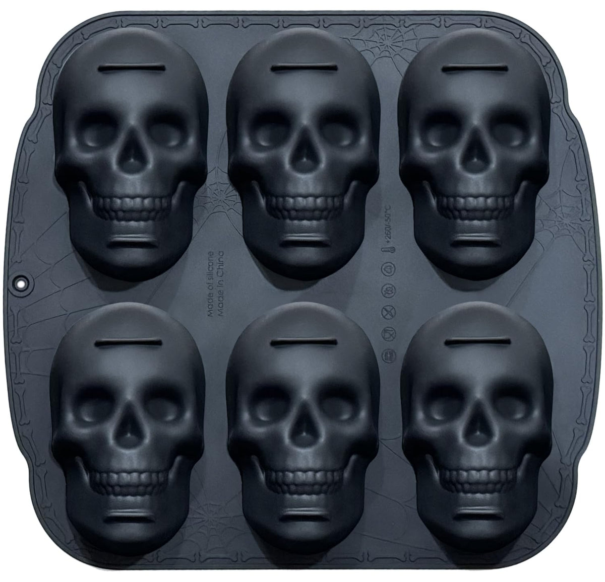 JETKONG 6-cavity skull cake pan delivers crisp details for fun party treats.