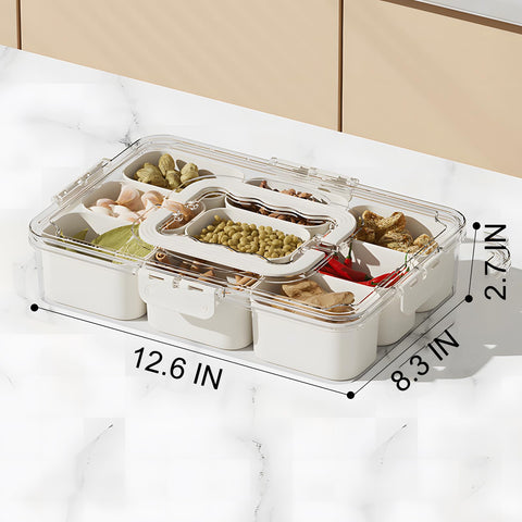 J-hong nine-compartment tray displayed on a table with colorful fruits and vegetables.