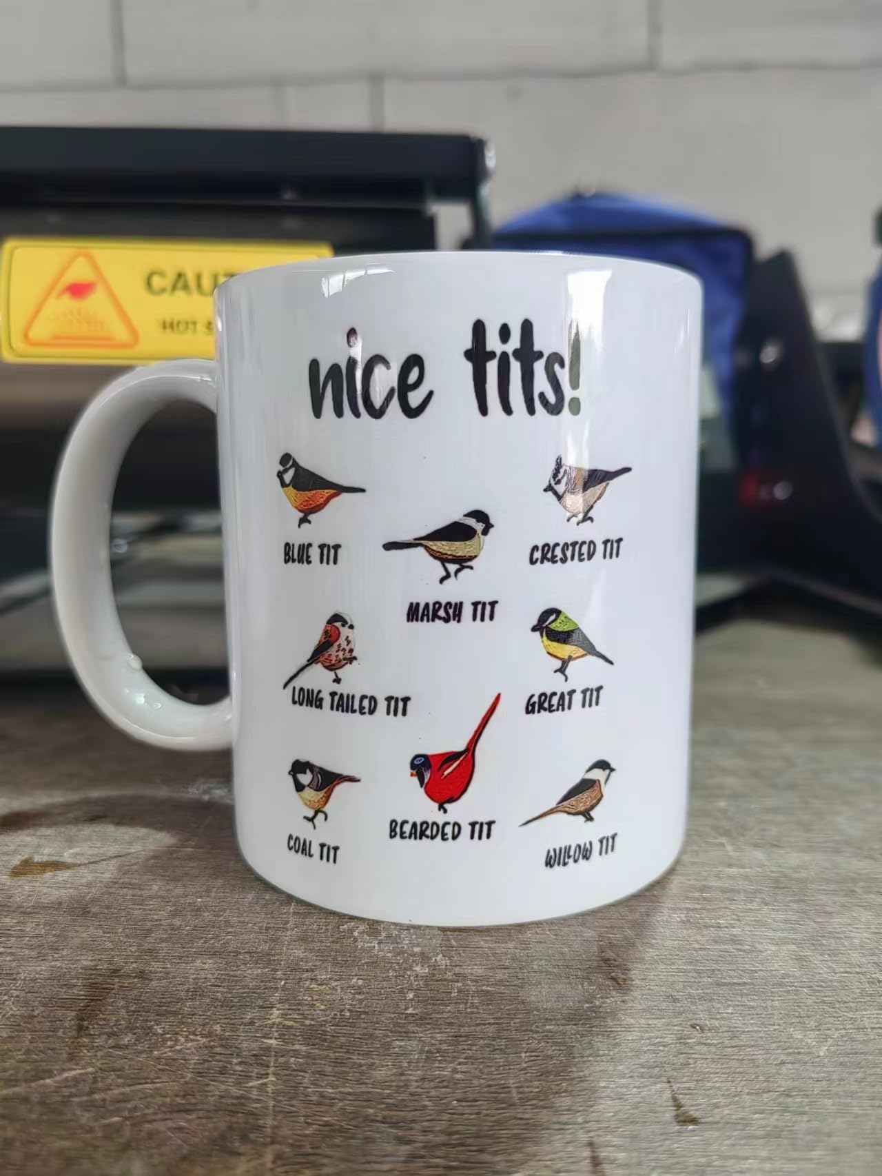 Jigfoxy Nice Tits Bird Mug side view, dual-side print visible.