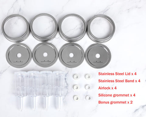 Jillmo airlock inserted into the lid for controlled venting during fermentation