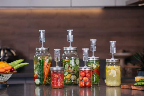 Jillmo four-lid kit on wide-mouth jars ready for batch prep