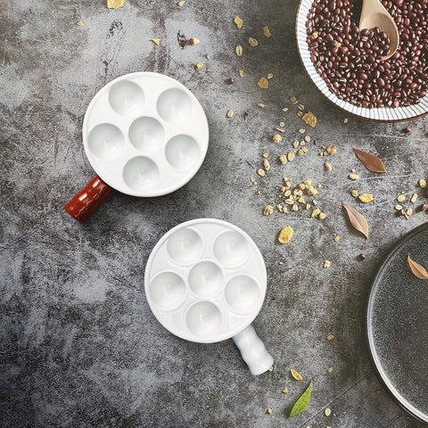 Jinsongdafa deep-groove pan design preserves sauces while roasting meats and seafood.