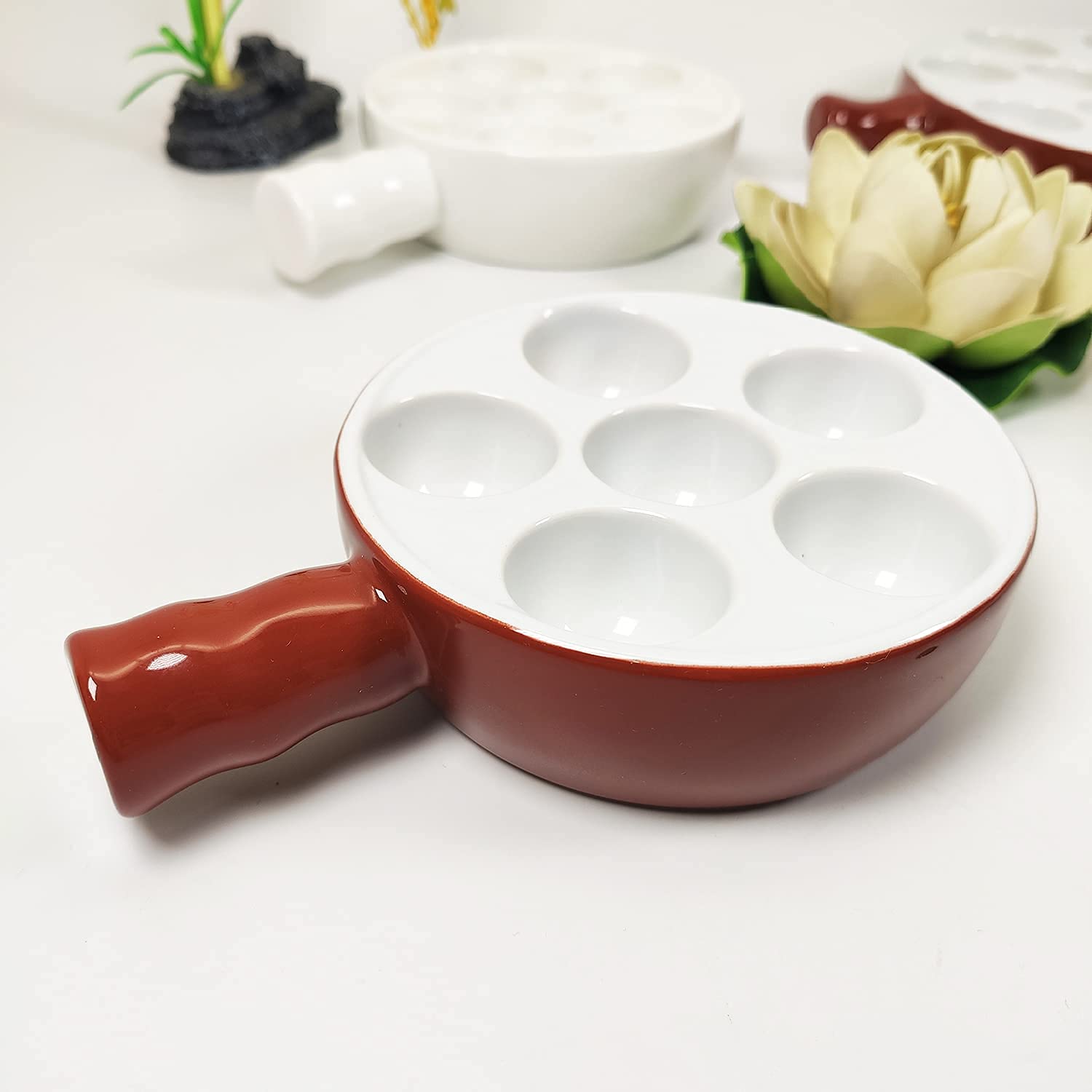 Jinsongdafa versatile snail plates suit meatballs, shrimp, scallops, or desserts.