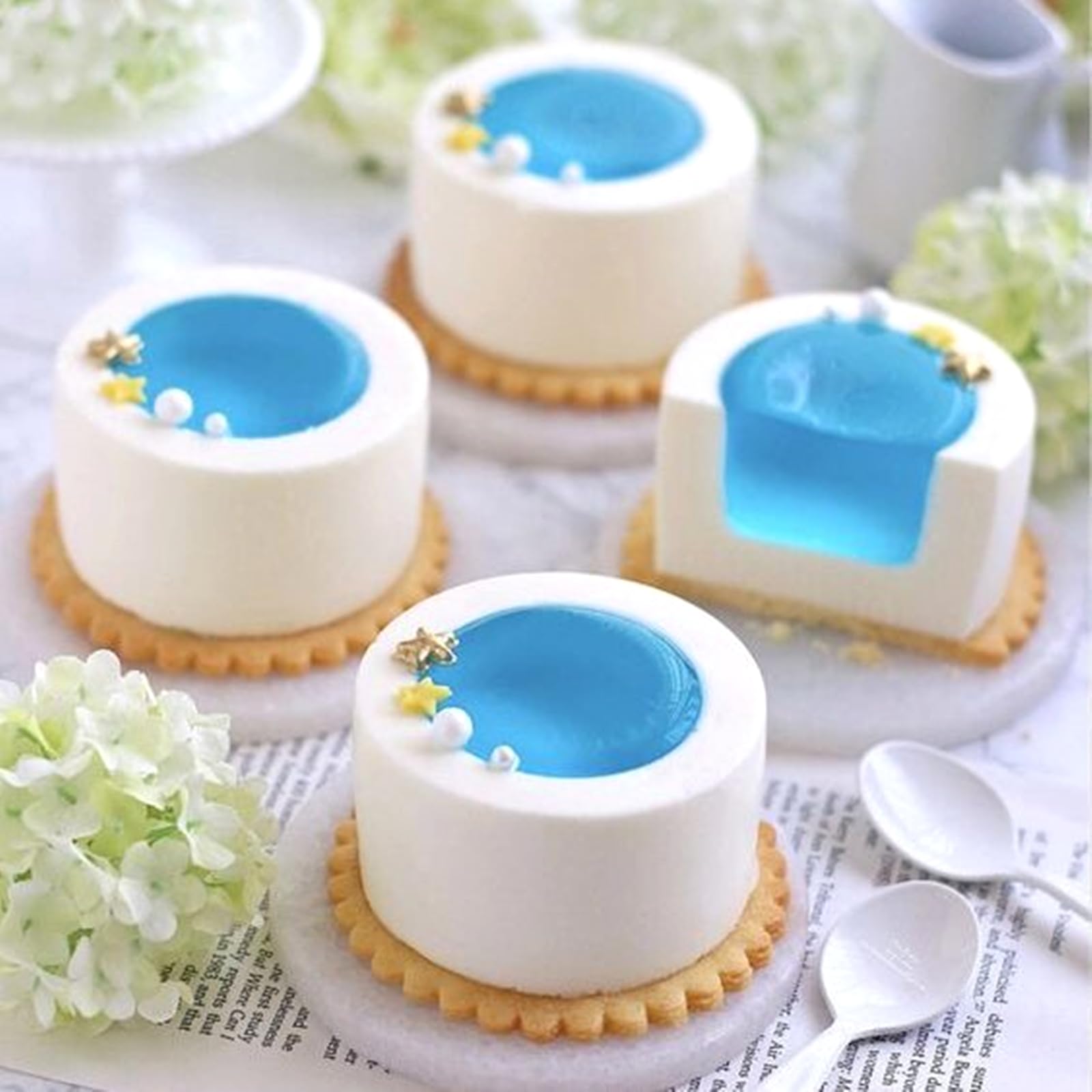 JOERSH cookie shot glasses being filled with cream.