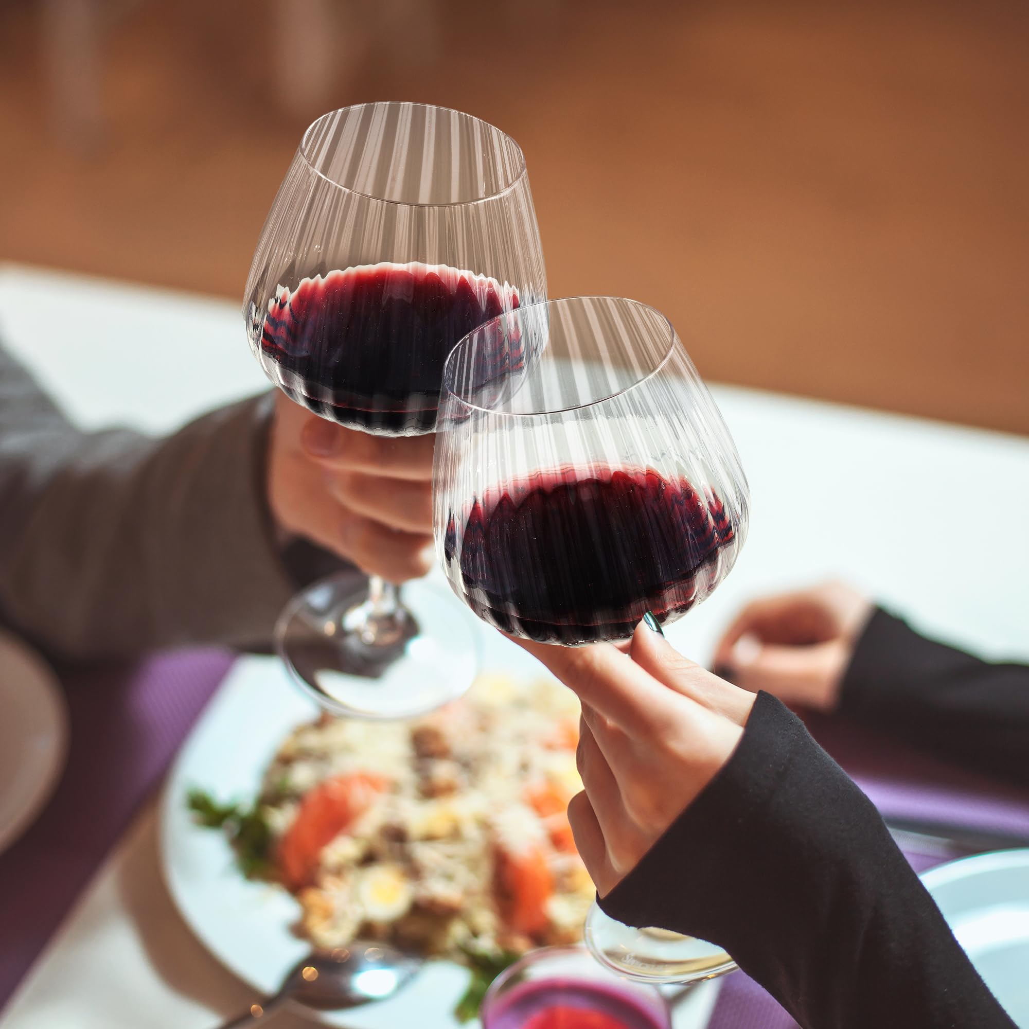 Joeyan crystal wine glasses reflection captures ambient light