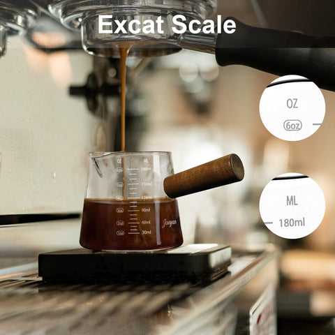 Joeyan wooden-handle measuring cup offers a comfortable grip during pouring