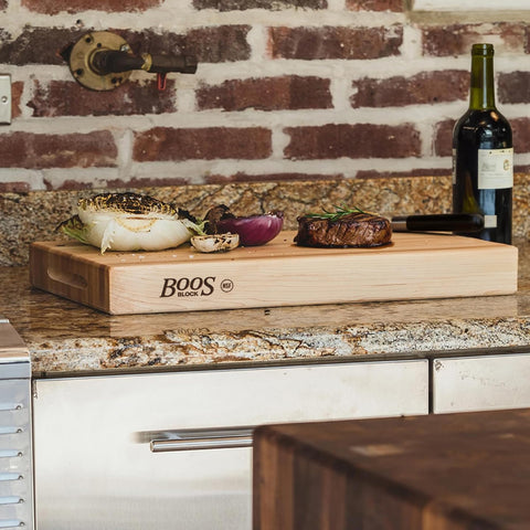 John Boos RA-Board knife-ready cutting surface shown in action.