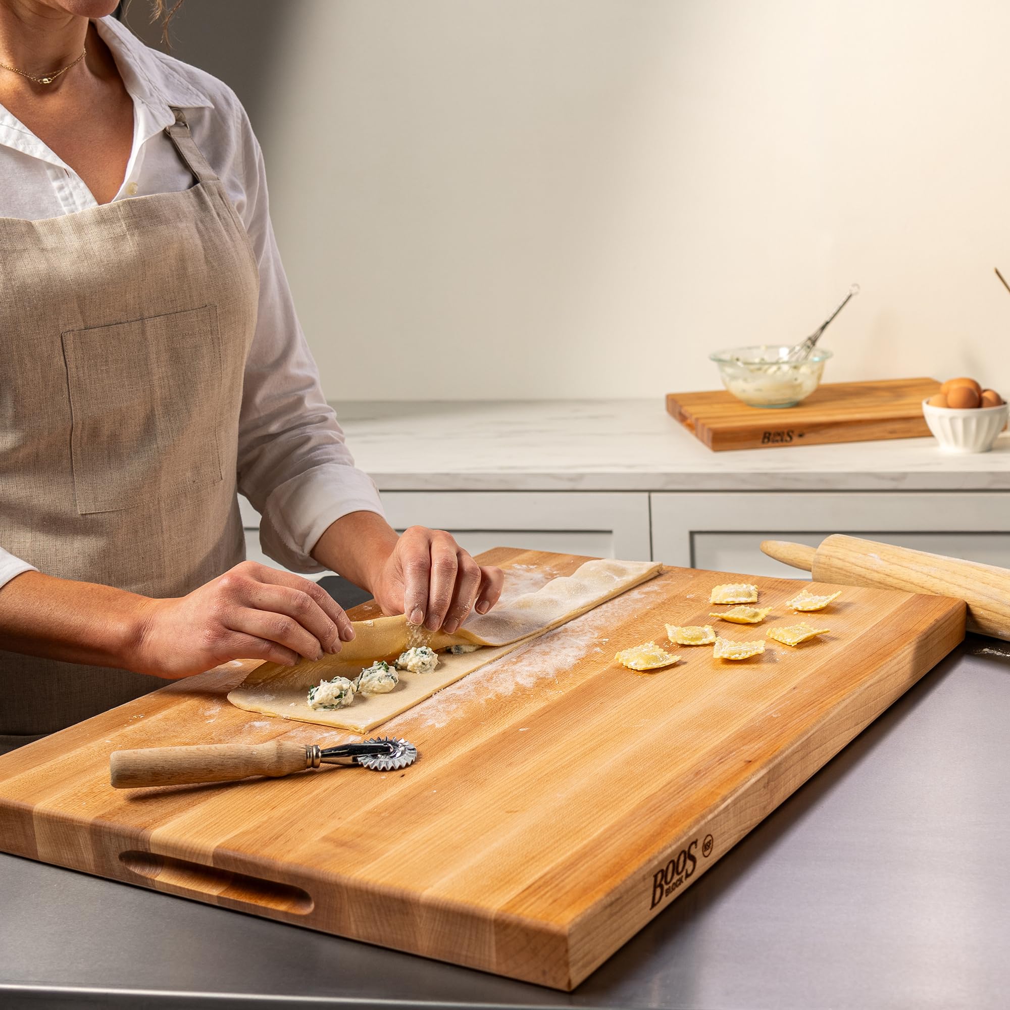 Careful hand-wash requirement for John Boos wood cutting board maintenance.