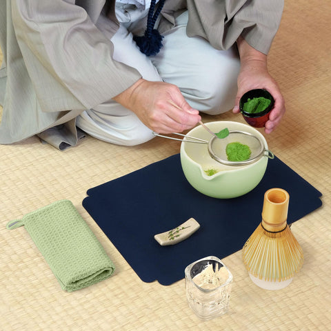 Joiish waterproof tea mat protects surfaces during tea rites.