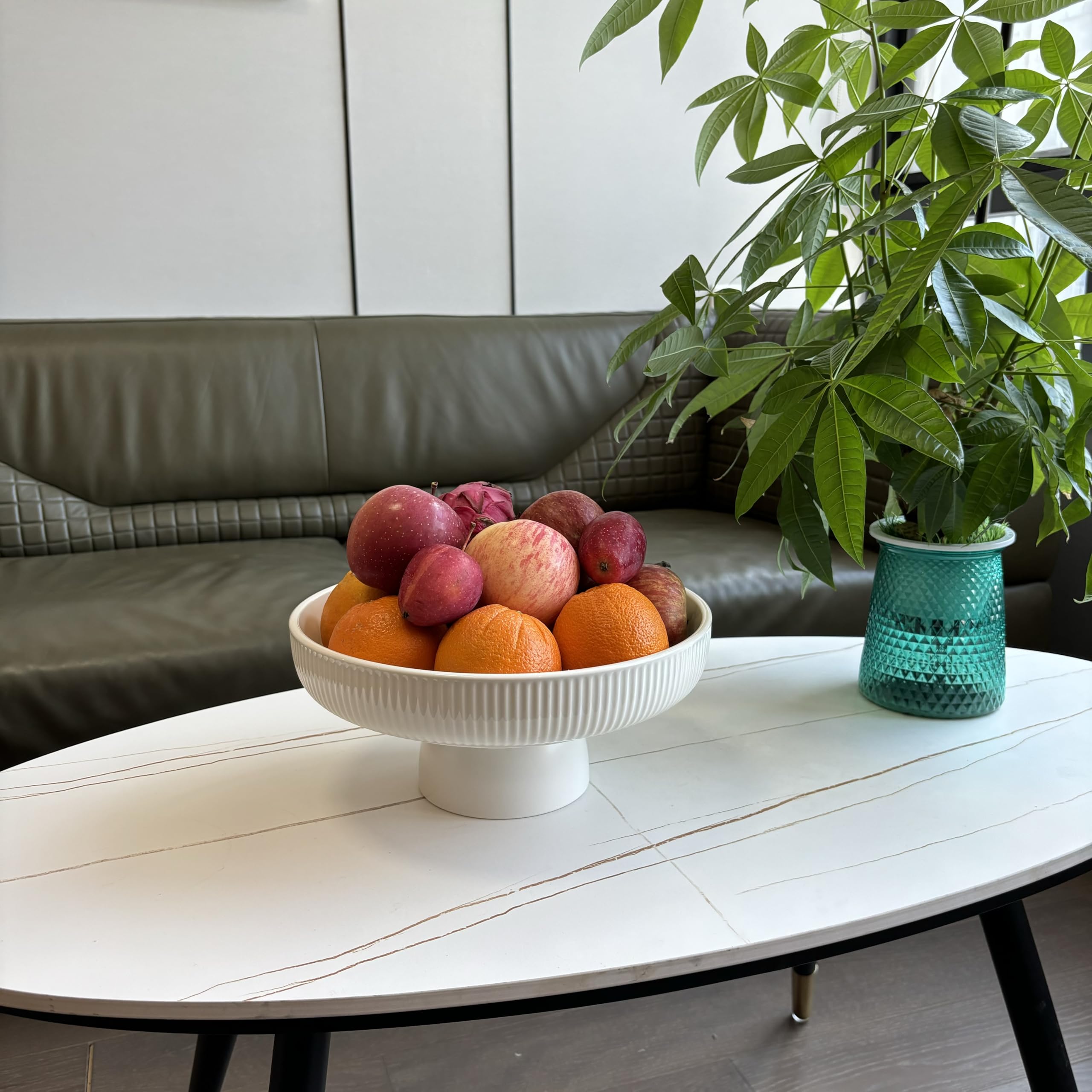 JolieJulie decorative bowl holds fruit and snacks neatly on a shelf.