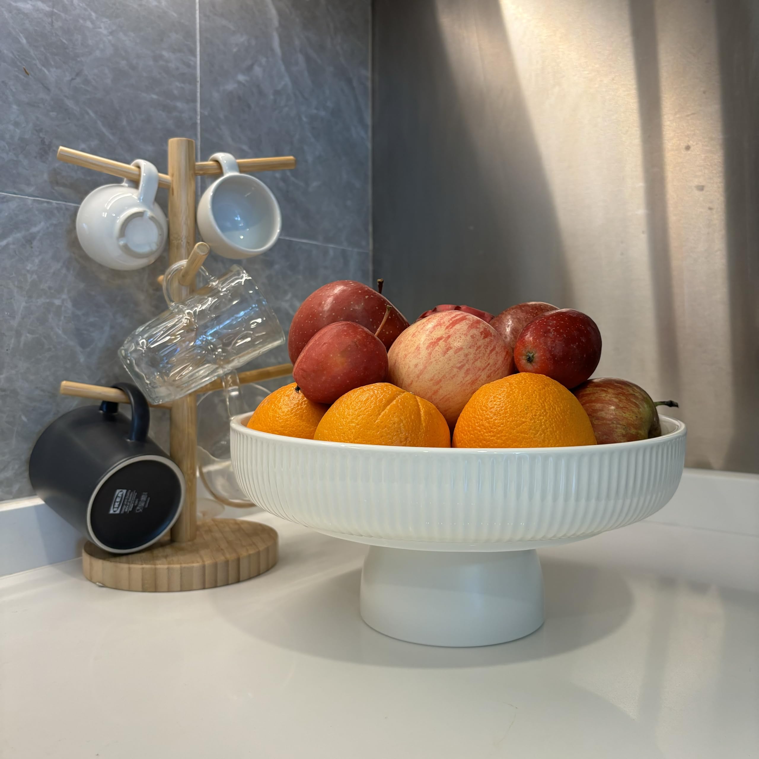 JolieJulie ceramic bowl serves as a versatile centerpiece for living room or counter.