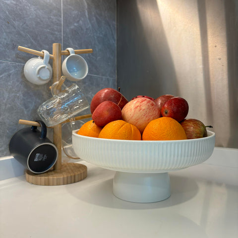JolieJulie ceramic bowl serves as a versatile centerpiece for living room or counter.