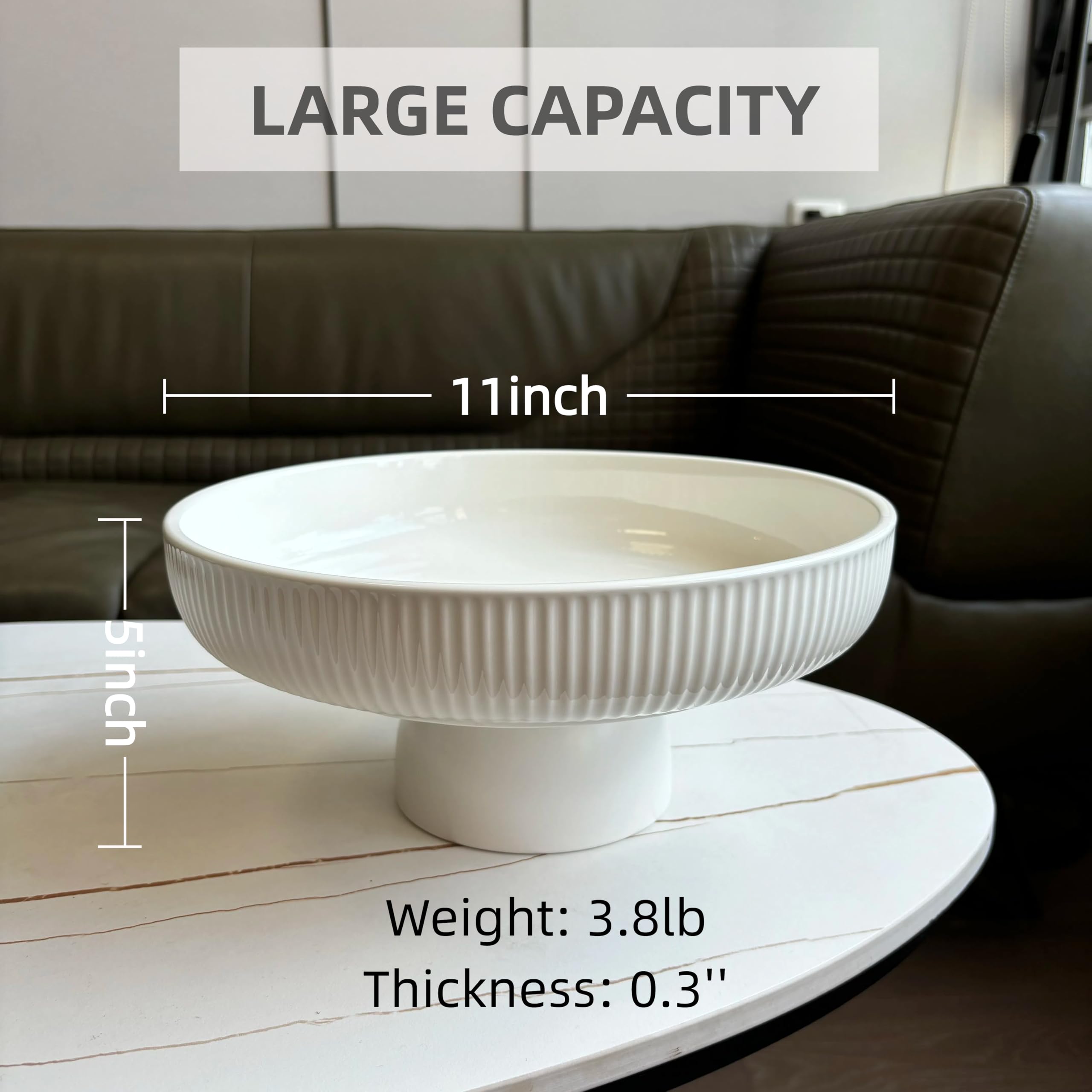 JolieJulie ceramic fruit bowl with pedestal base elevating snacks on dining table.