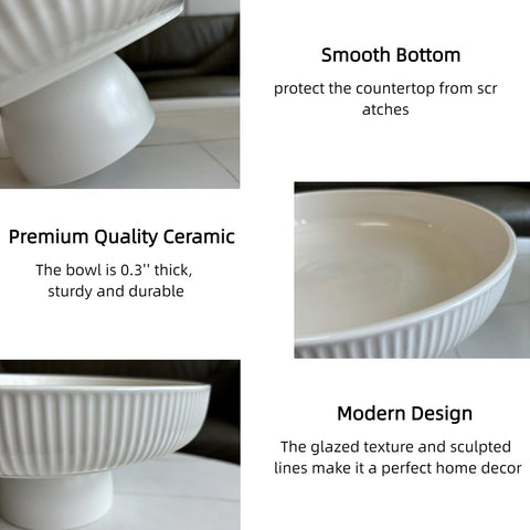 JolieJulie ceramic fruit bowl with white glaze and black pedestal elevates modern kitchen decor.