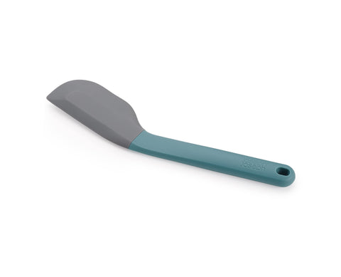 Joseph Joseph Duo silicone spatula with ergonomic head for easy bowl scraping.
