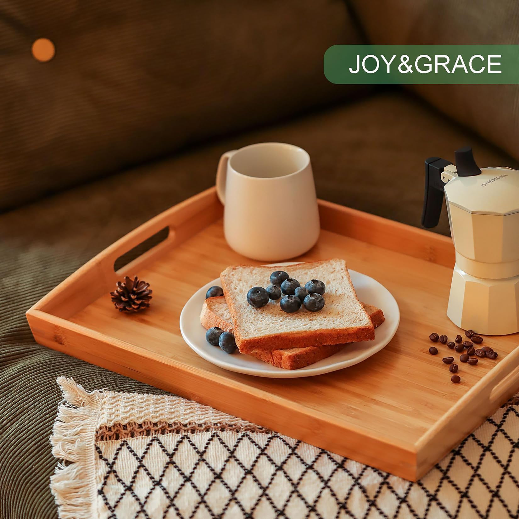 Joy&Grace bamboo tray on ottoman as decorative centerpiece