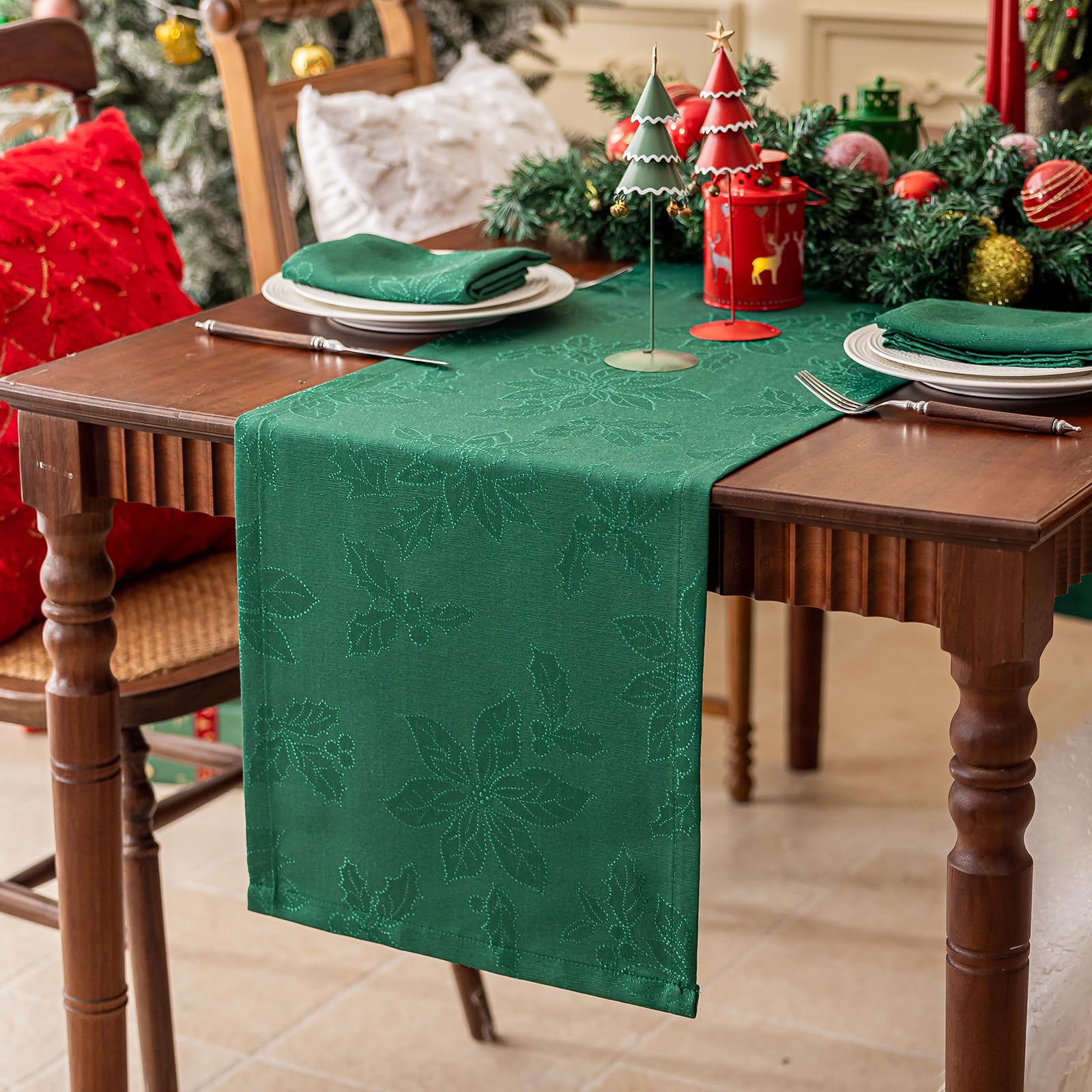 Joyfol Day Christmas table runner with green poinsettia weave enhances holiday tables