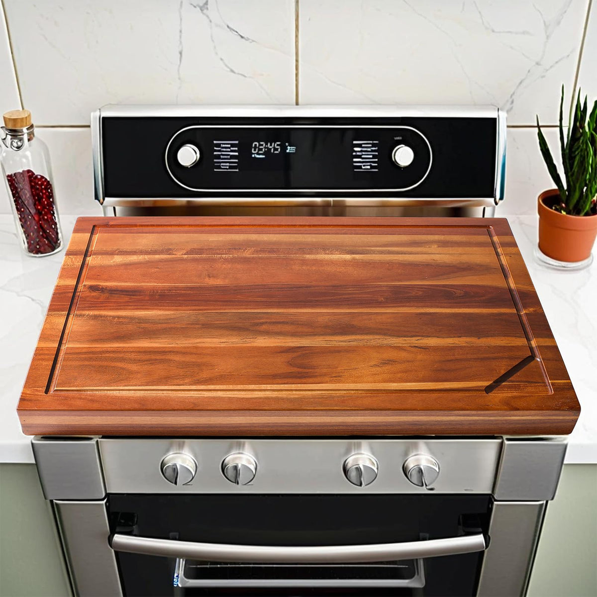 Jubilander acacia wood stove cover board adds extra counter space in the kitchen.