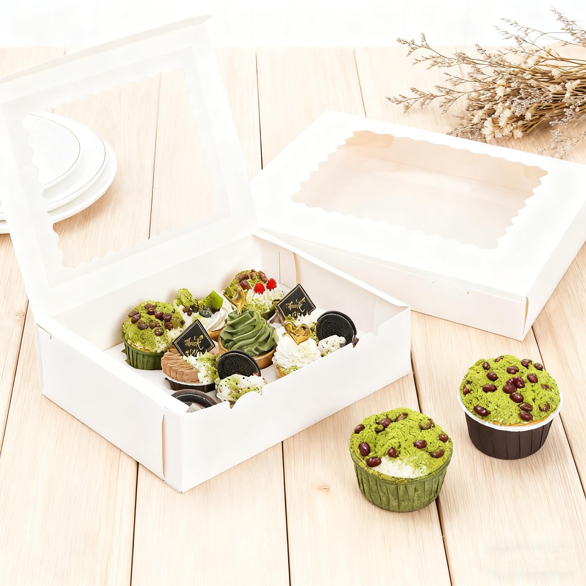 Jucoan 12-count insert keeps cupcakes evenly spaced and secure.