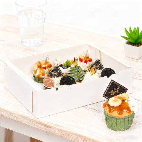 Jucoan white bakery boxes suitable for parties and displays.