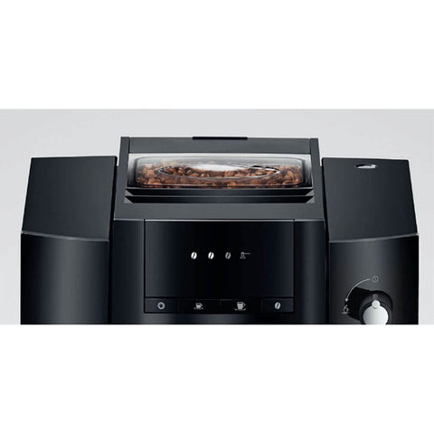 Jura E4 aroma grinder and brewing unit delivering rich espresso