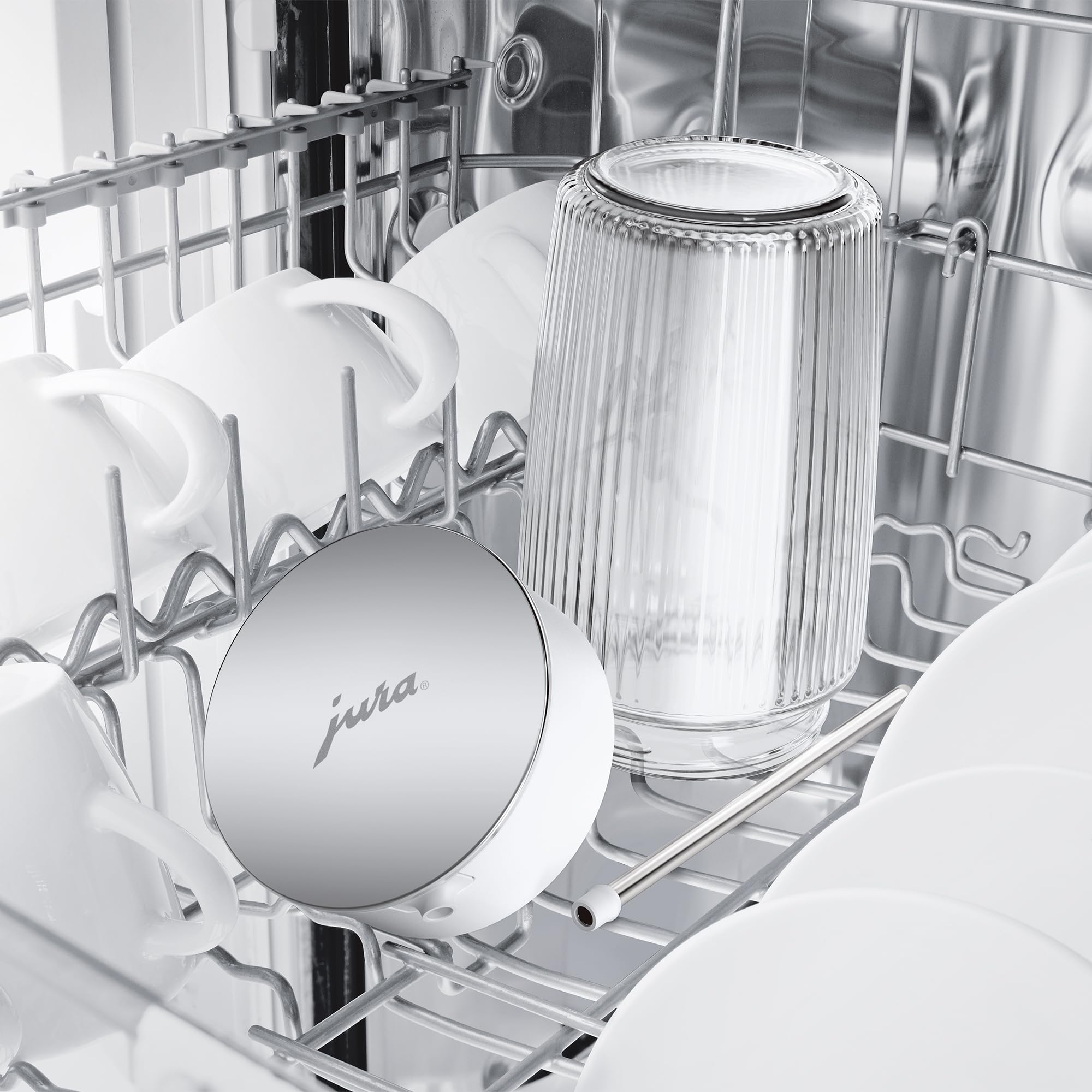 Sturdy base keeps the Jura glass milk carafe steady during use.