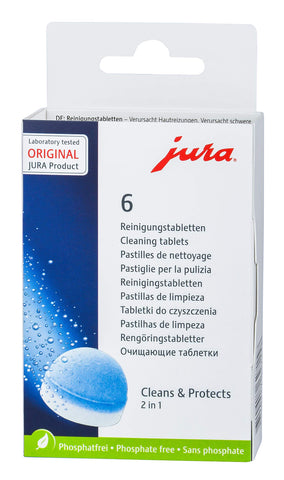 Jura descaling tablets close-up illustrating compact tablets for cleaner internals.