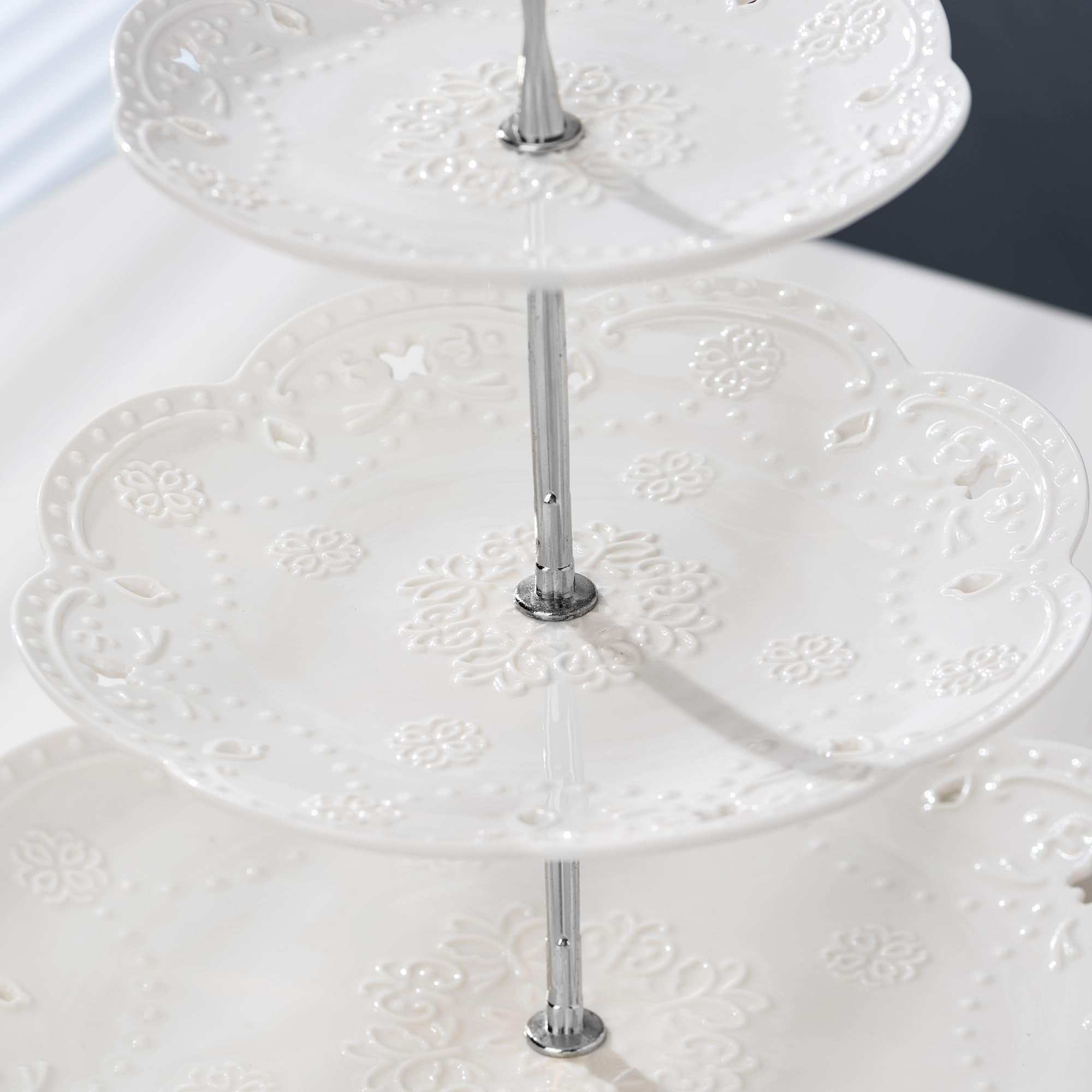 Jusalpha three-tier stand middle tier 8-inch showcase desserts and cupcakes.
