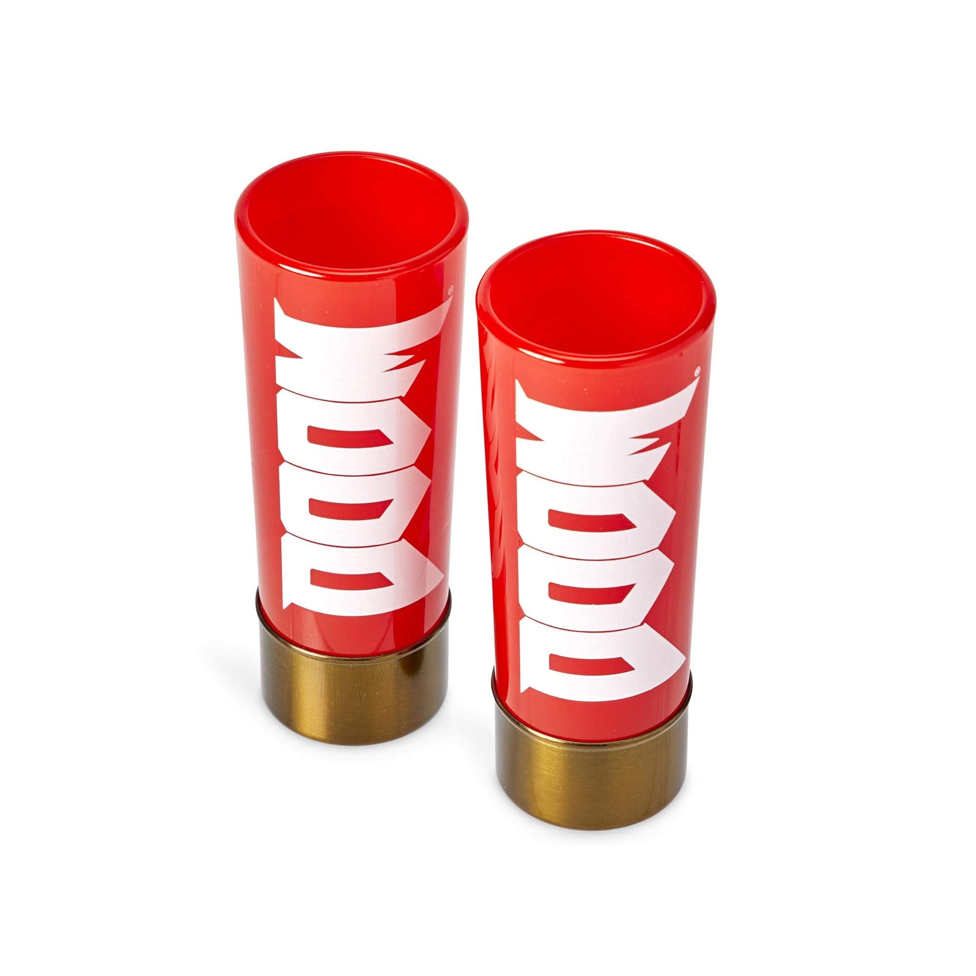 Close-up of DOOM logo on shot glass with metal bottom for sturdy barware.
