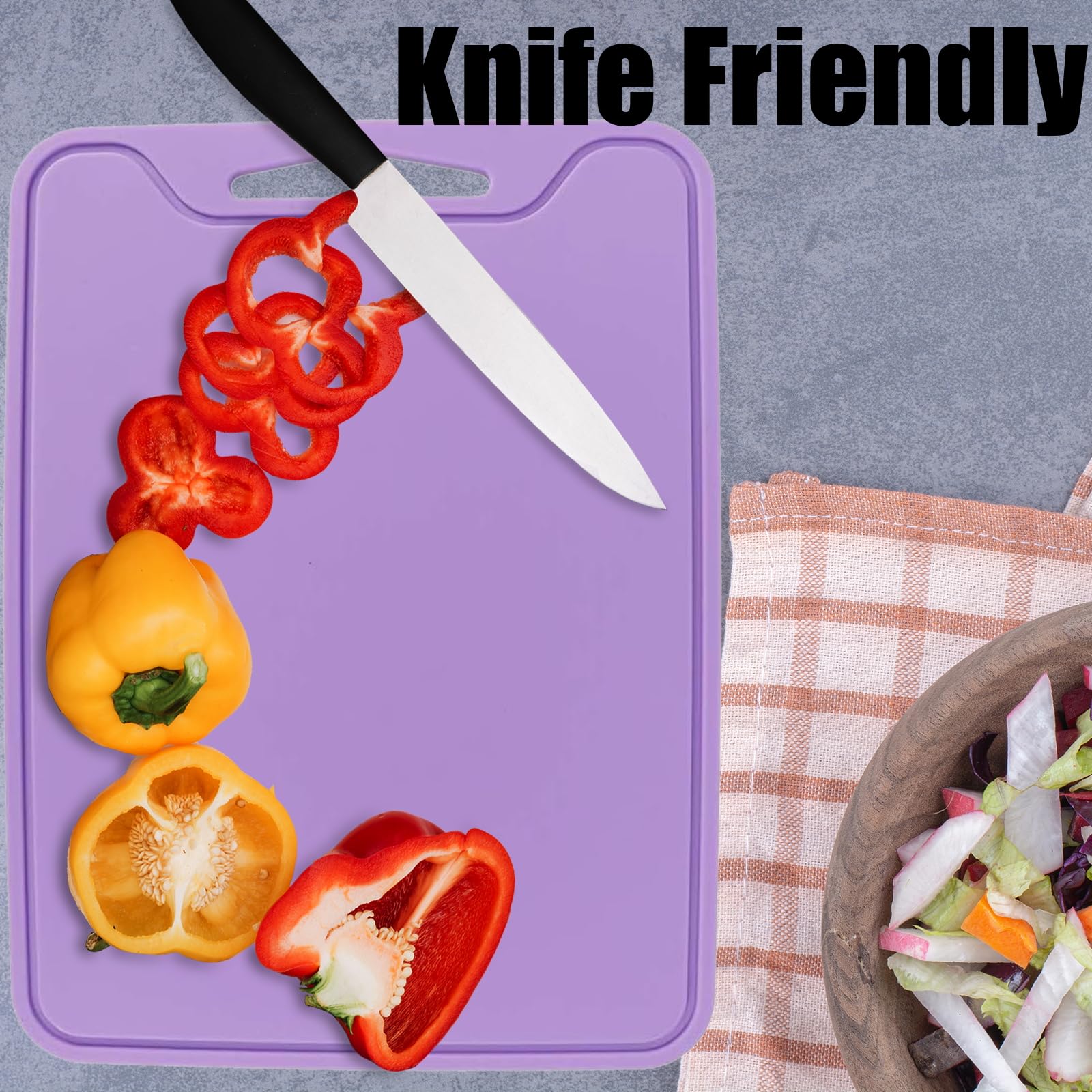 JUSTHERE purple cutting board adds color with a non-stick surface for versatile prep.