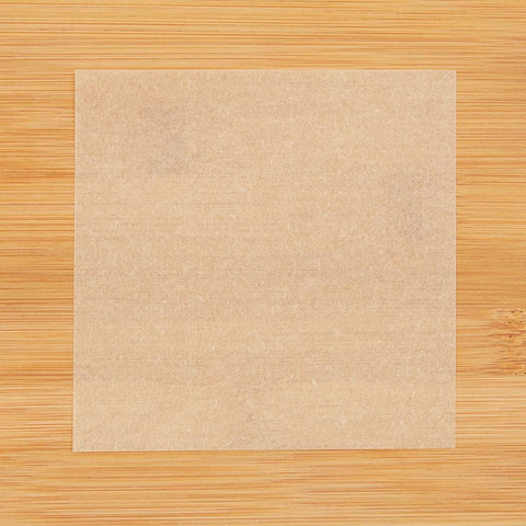 Juvale cookie box liners using parchment paper squares for gift-ready presentation.