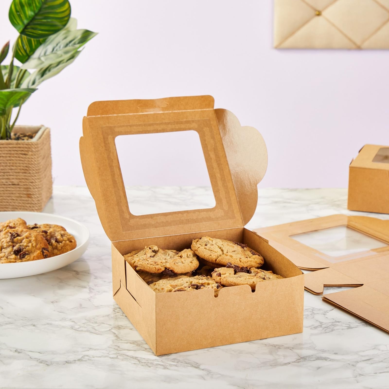 Juvale dessert box frames cookies, cupcakes, and muffins with a clear window.