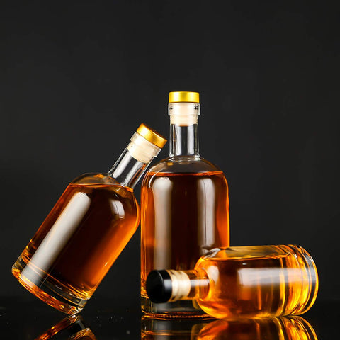 Kaachli clear glass bottle side view highlighting 6 oz capacity for easy packing.