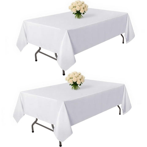 Kachanaa 2-pack white rectangle table cloth on a table for effortless cleanup.