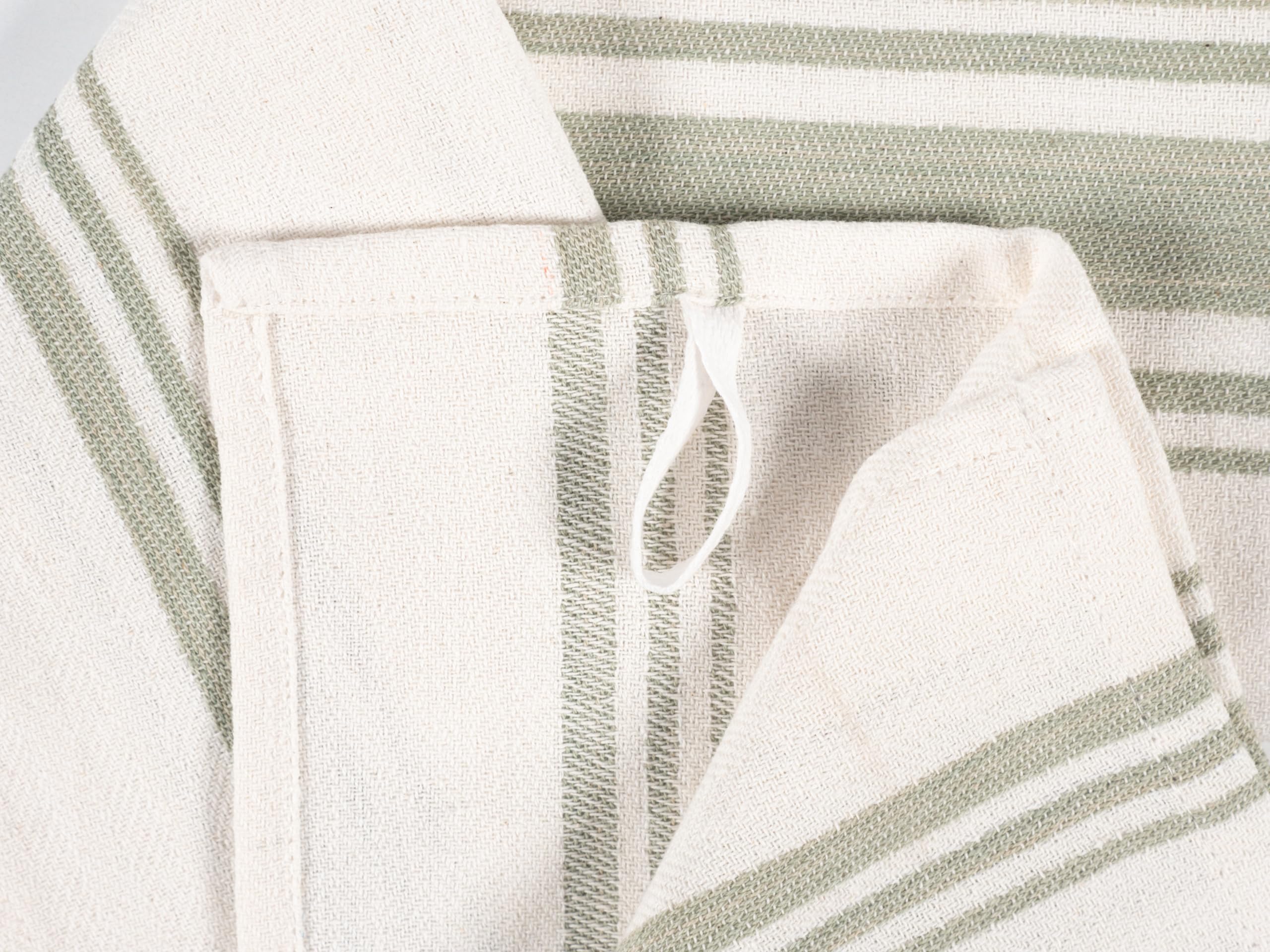 KAF Home Sage dish towels on rack, versatile for cooking, cleaning, and drying.