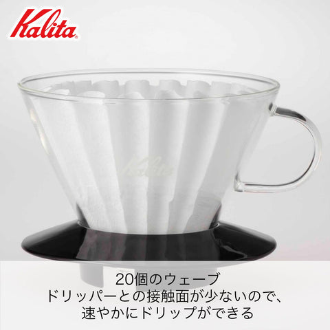 Kalita Wave 185 showing water pooling on coffee bed for controlled agitation.