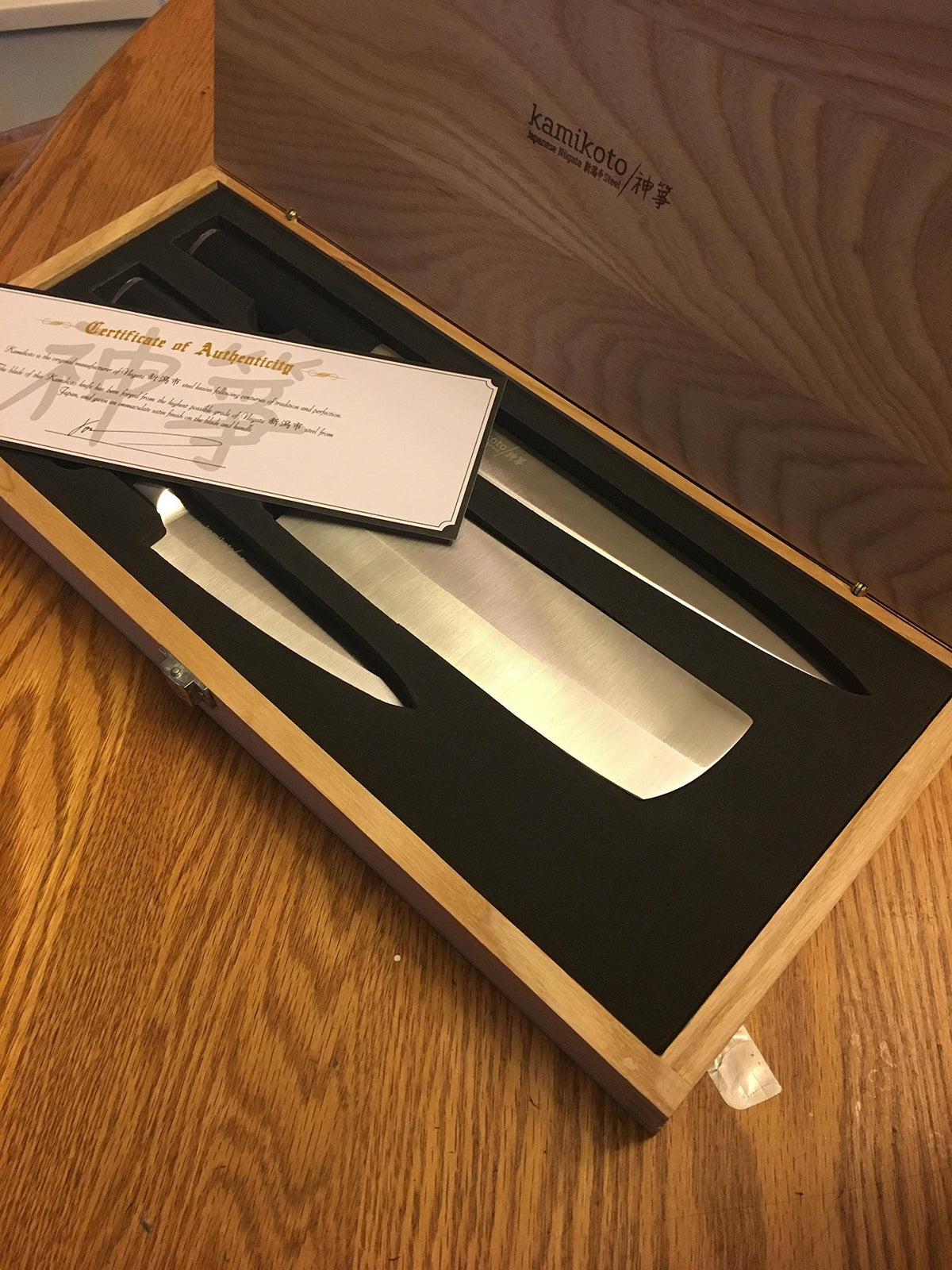 Kamikoto Kanpeki knife set in a wooden display box for premium kitchen display