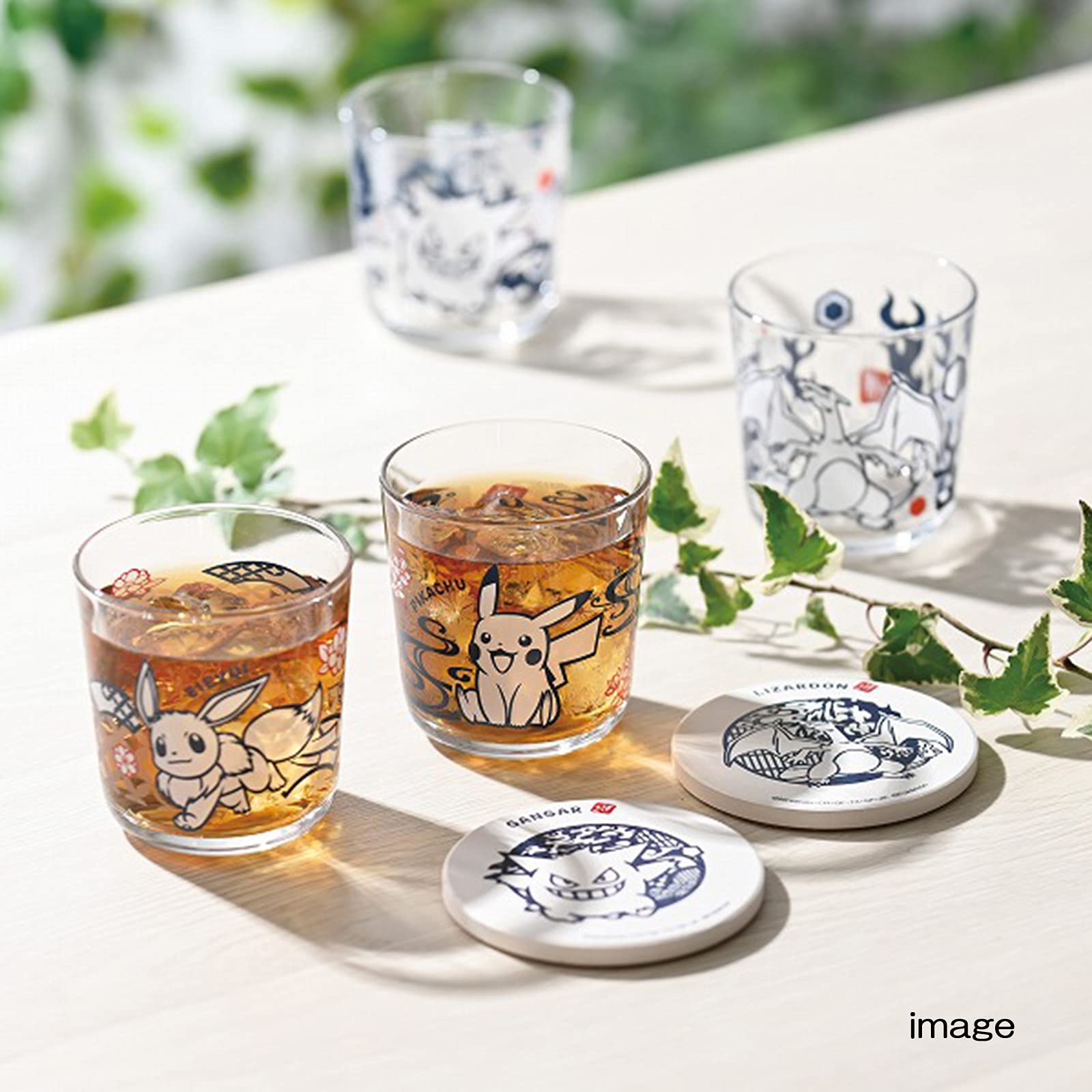 Kaneshotouki Pokemon Gengar glass cup shows white character against drink for eye-catching appeal.