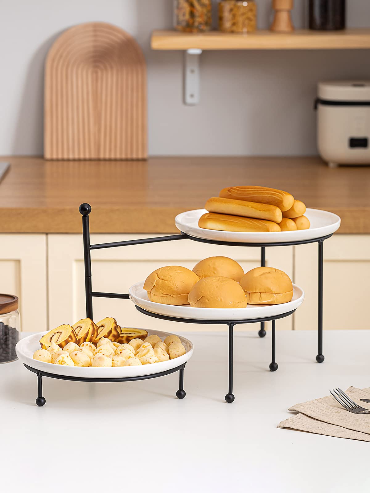 Kanwone durable wrought metal rack complements modern décor.