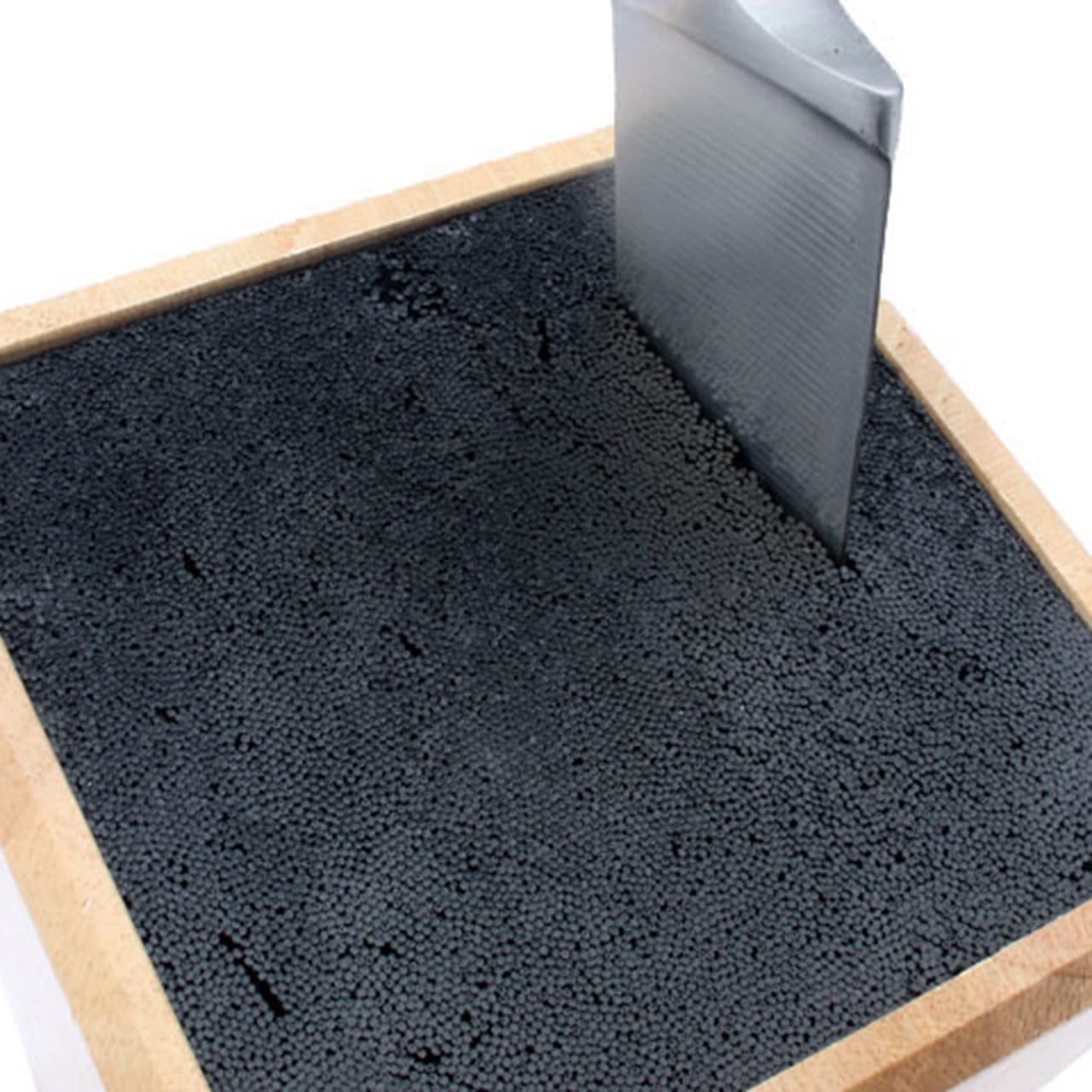 Kapoosh Dice Knife Block top-rack dishwasher safe design in use.