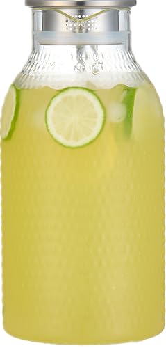 Karafu lid-two-outlets for fast pour and filtration.