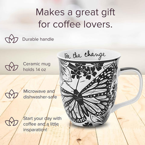 Close-up of butterfly illustration on Karma mug