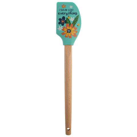 Karma silicone spatula with wood handle, heat resistant for nonstick cooking.