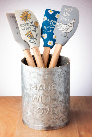 Karma spatula with charming design enhances kitchen decor and gentle mixing.
